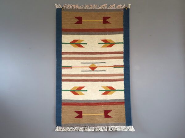 Arrows by Blue Wall Hanging